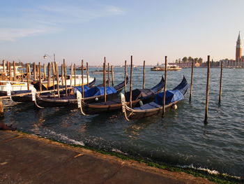 Boats moored in sea