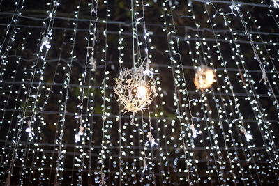 Low angle view of illuminated chandelier