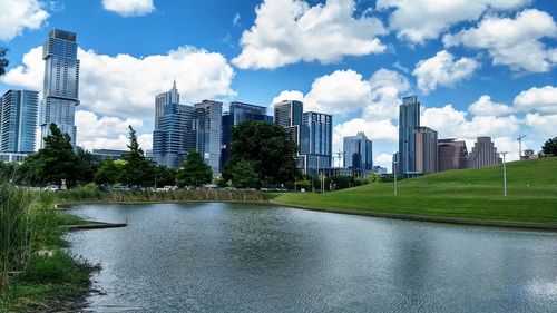 River against buildings in city