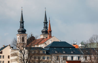 Houses and buildings against sky