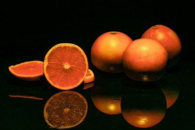 Close-up of orange fruits on table