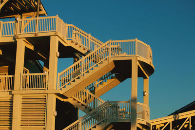 Low angle view of metallic structure against clear sky