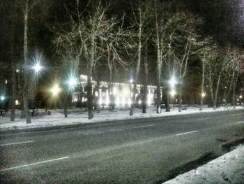 Illuminated street lights at night