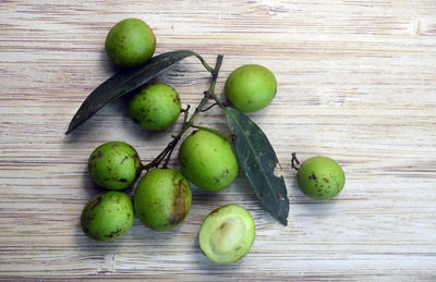 High angle view of green fruits on table