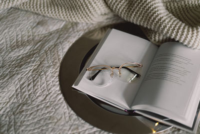 High angle view of wedding rings on table