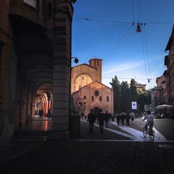 Buildings in city against sky