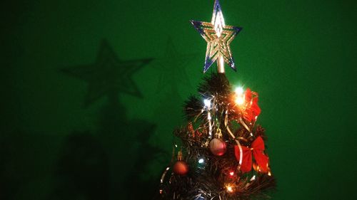 Low angle view of illuminated christmas tree