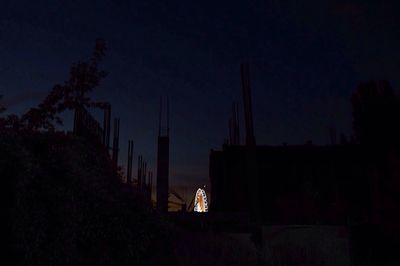 Silhouette of city at night