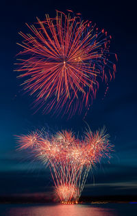 Firework display at night