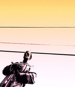 Low angle view of statue against clear sky
