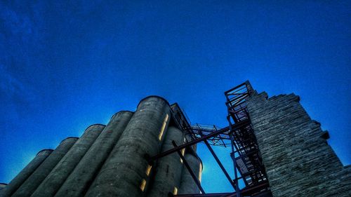 Low angle view of built structure against blue sky