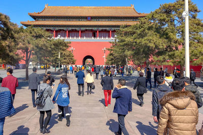 Group of people in front of building