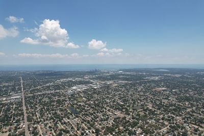 Aerial view of city against sky