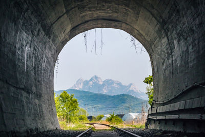 Arch bridge against sky