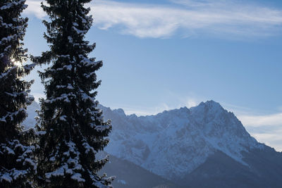 Scenic view of mountains against sky during winter