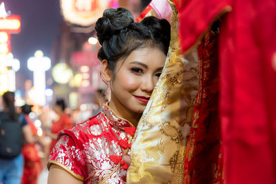 Woman buying dress in store