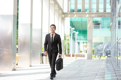 Full length of a young man in city