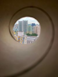 Modern buildings seen through window