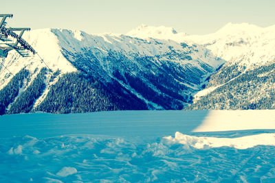 Scenic view of mountains against sky during winter
