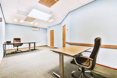 Empty chairs and tables at home