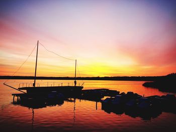 Silhouette of marina at sunset