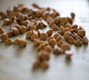 Close-up of chocolate chips on table