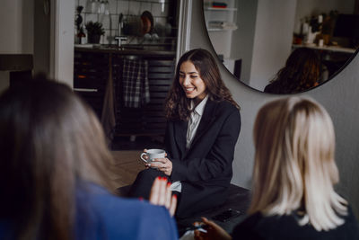 Female coworkers having meeting in office