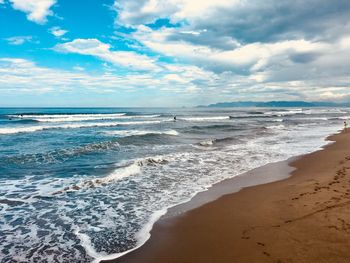 Scenic view of beach against sky