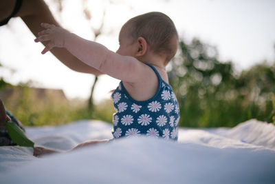 Baby girl with mother