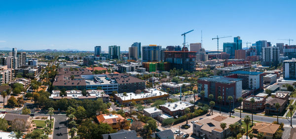 Cityscape against clear sky