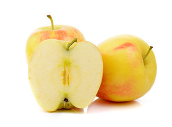 Close-up of apple against white background