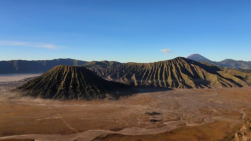 Panoramic view of volcanic mountain against sky