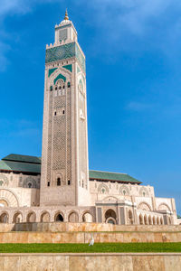 Low angle view of historical building against blue sky