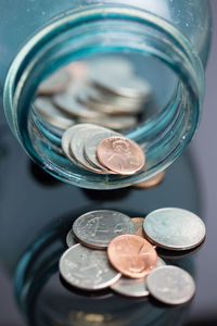 High angle view of coins on table