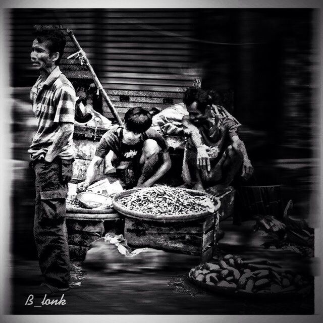 transfer print, men, indoors, human representation, market, auto post production filter, lifestyles, retail, for sale, market stall, person, art and craft, sale, large group of people, statue, art, leisure activity
