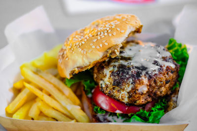 Close-up of burger with french fries