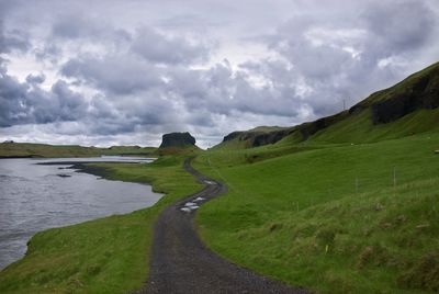 Scenic view of land against sky