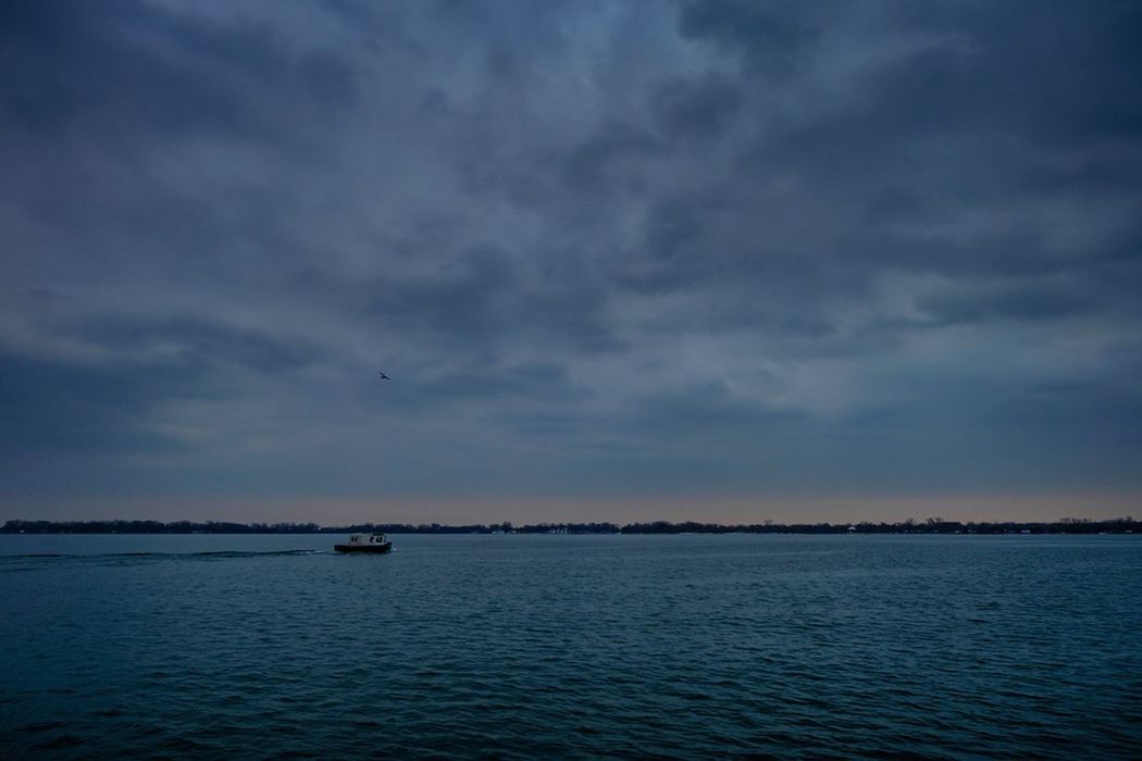 SCENIC VIEW OF SEA AGAINST SUNSET SKY