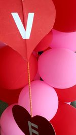 Low angle view of multi colored balloons