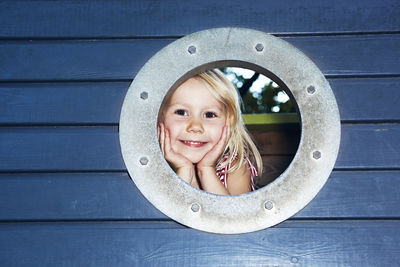 Portrait of smiling girl at playground, sweden