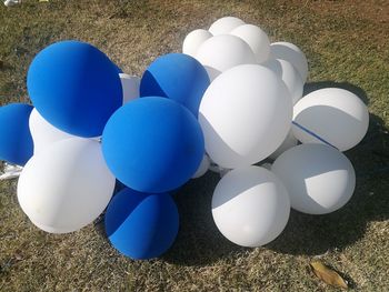 High angle view of balloons on field