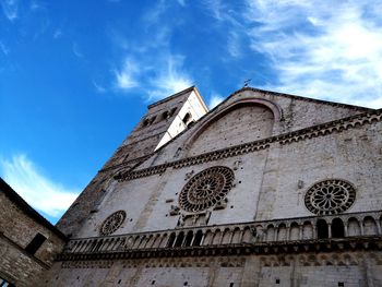 Low angle view of ornate building against sky