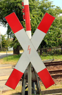 Close-up of red flags on field