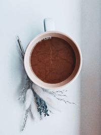 High angle view of coffee cup on table