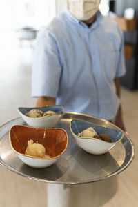 Midsection of man having food