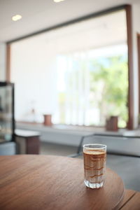 Coffee cup on table at home