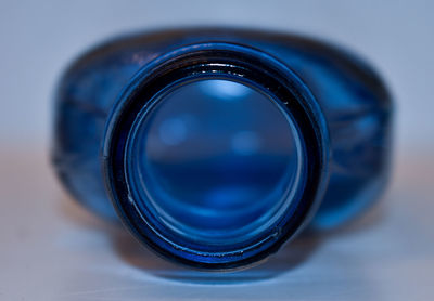 High angle view of blue glass on table