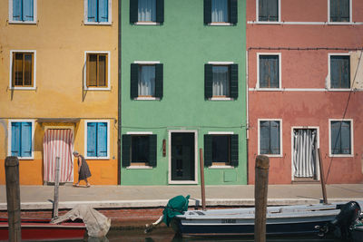 Residential building by street in city