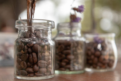 Close-up of glass jar on table
