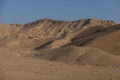 Scenic view of desert against clear sky